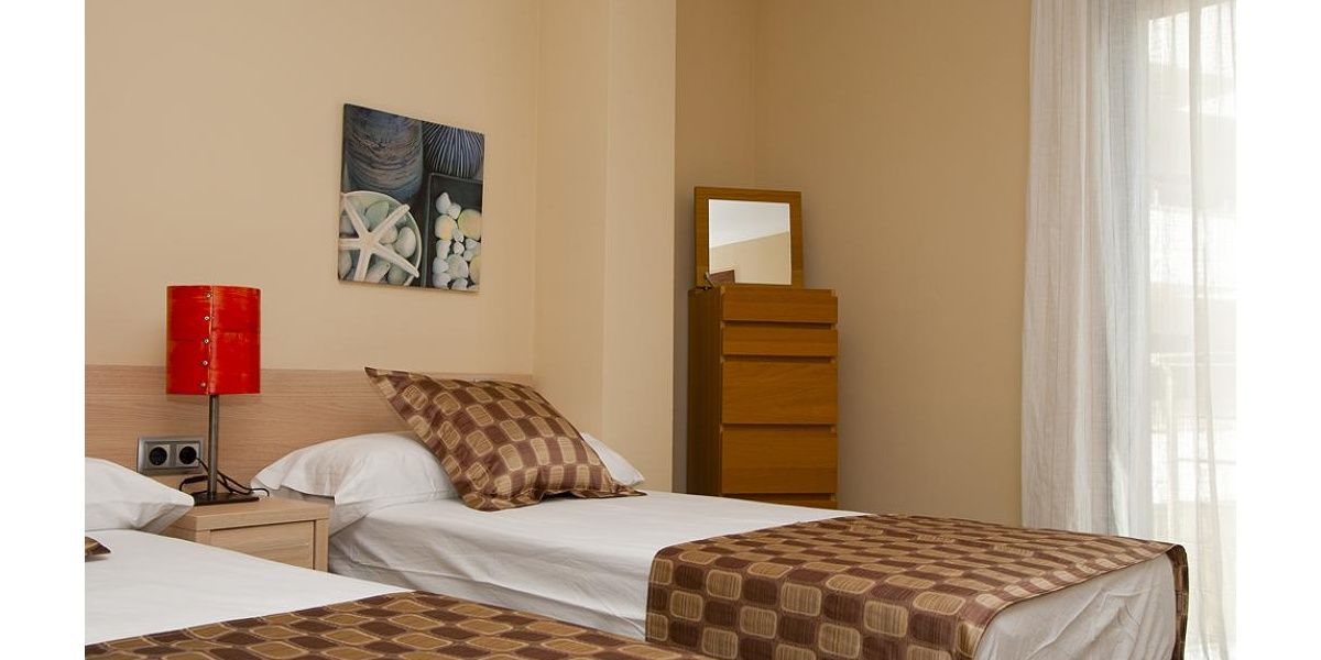 Bedroom with two single beds.