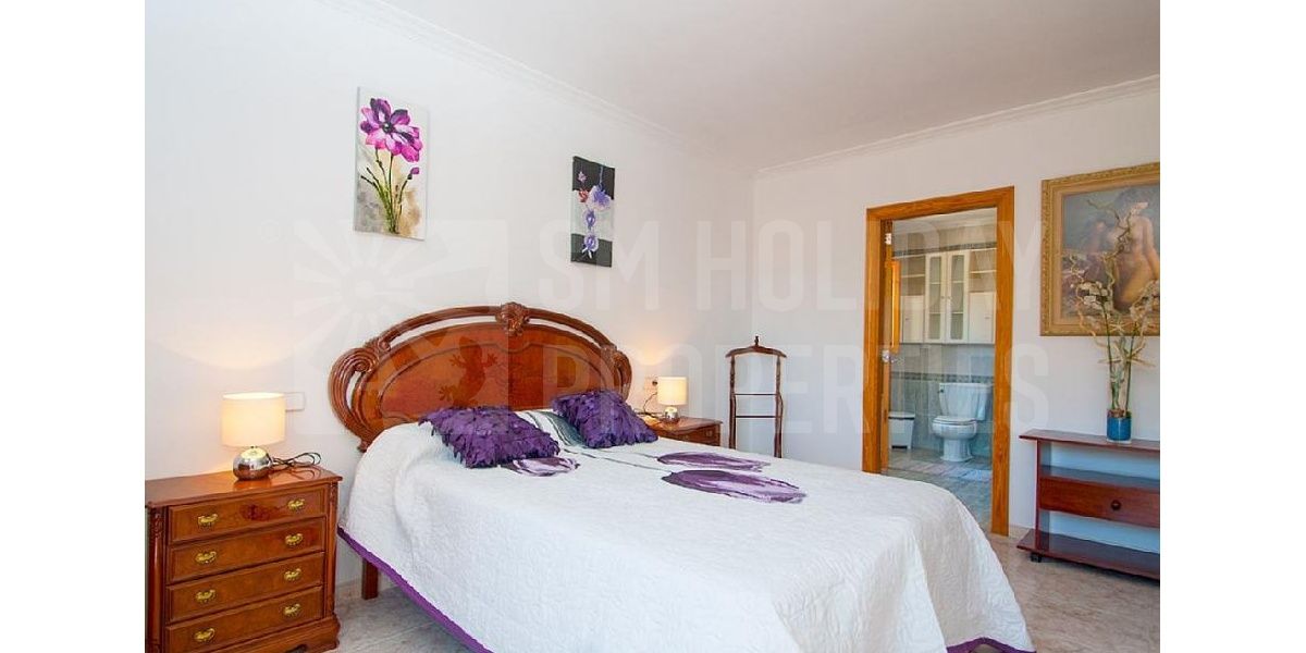 The two fantastic bedrooms in the villa have a full private bath and balcony..